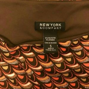 Chocolate, pink, and tan shortsleeved top